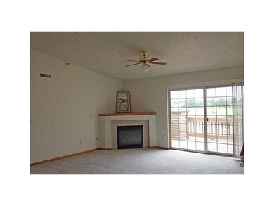 Living Room. Gas fireplace, slider leading to deck