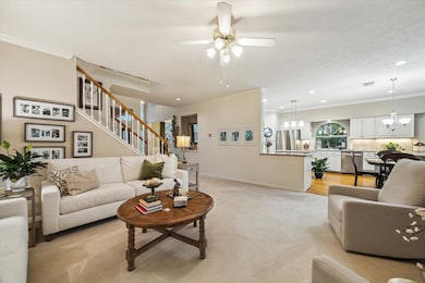 The family room has loads of natural light, is open to the kitchen and boasts plenty of space for family gatherings and quiet evenings at home.