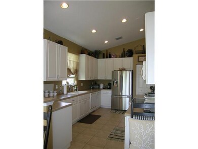Kitchen. Spacious kitchen eating area opens to rea
