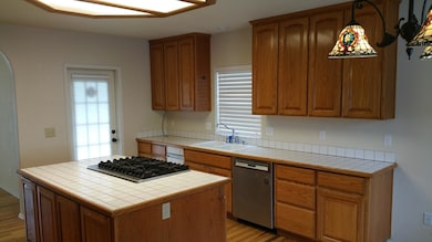 Kitchen island to counter with sink and