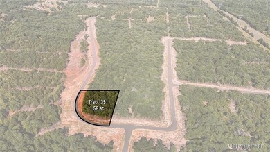 Aerial view of property and surrounding area with property boundaries highlighted