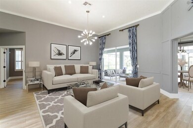 Virtually staged formal living room.
