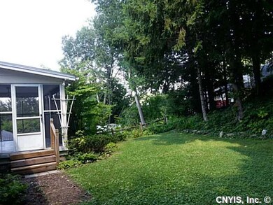 Backyard. Walk out of the screened porch into the 