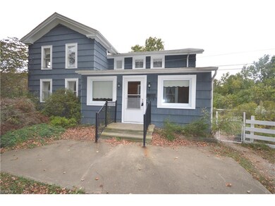 Side Exterior to Enclosed Porch & Patio