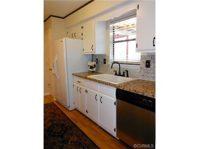 Kitchen. Newly renovated with new counters, tile b
