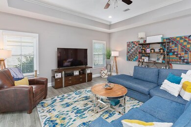 tall ceilings in great room with recessed lighting