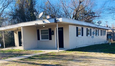 View of front of property featuring a front yard a