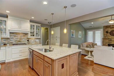 An oversized island that has even more cabinets in