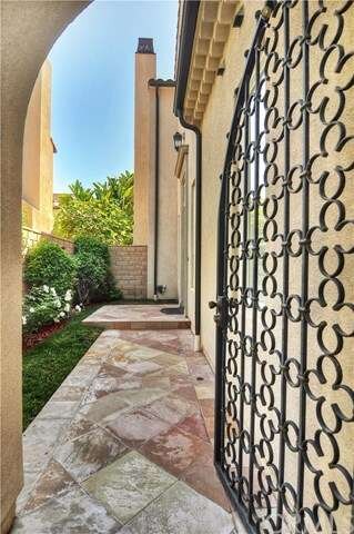 Gated sandstone portico 