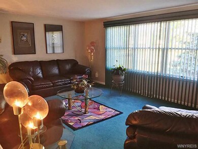 Living Room. Wonderful windows bring the outside i