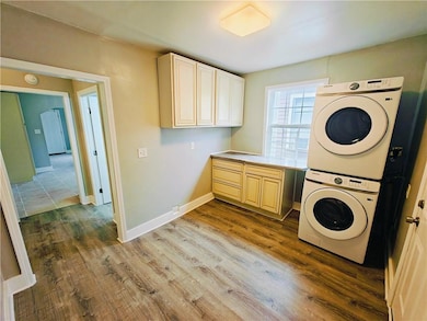 Utility room looking towards hall and kitchen.