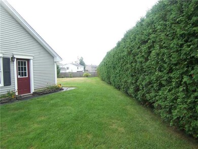 Yard/Garden. Side door entry into...