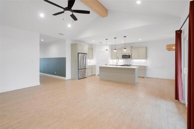 Kitchen featuring light hardwood / wood-style floo