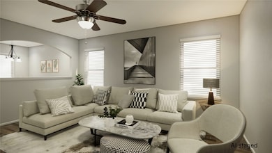 Living room featuring plenty of natural light, bas