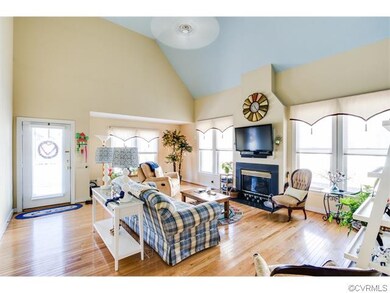 This large living room features windows on two sid