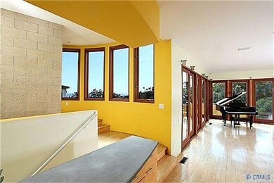 Open living/dining area with dramatic views.