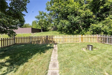 Part of the back yard is fenced in.