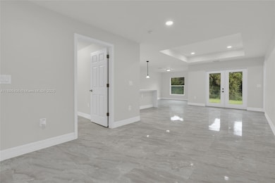 1006 Asther St E, Lehigh Acres, FL 33974 - photo 2