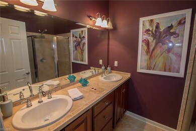 Main bathroom with dual vanities.