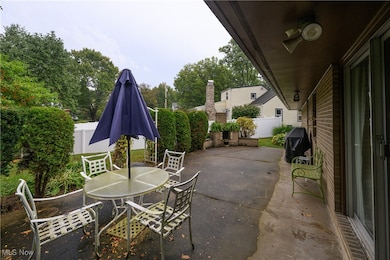 Fenced backyard with a patio, area for grilling, and outdoor dining area