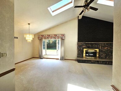 Enter foyer to the family room with cathedral ceil