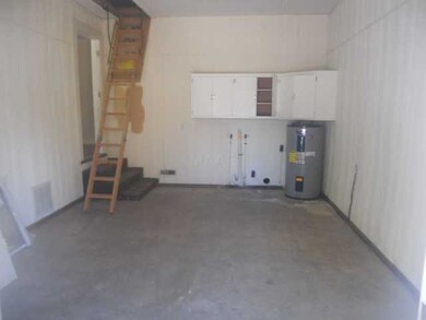 Laundry,storage, and attic access.