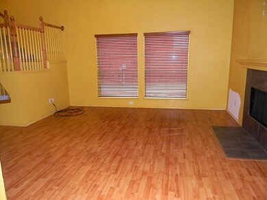 Spacious living room with fireplace.