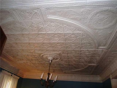 Living Room. TIN CEILING DETAIL IN LIVING RM.