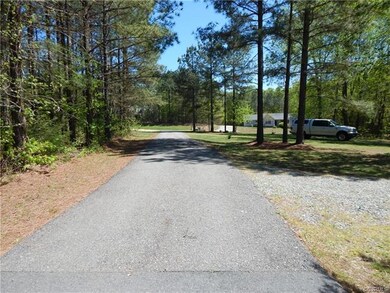 Main Drive is paved back to the Garage entrance!