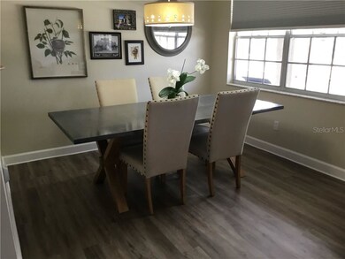 VERY LIGHT DINING AREA WITH NEW FLOORING