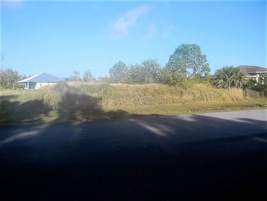 Front street view of lot shows how it was once par