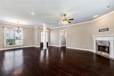 Living area open to formal dining area & foyer