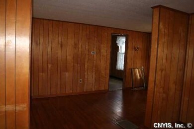 Living Room very nice hardwoods in both double liv
