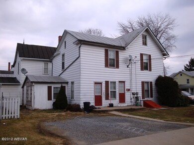 rear/side view w parking spaces