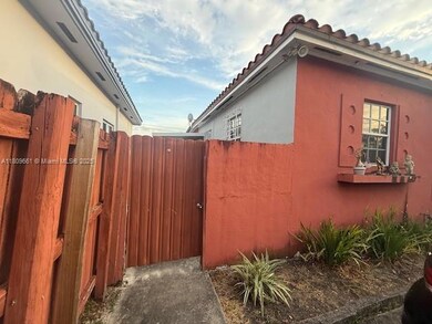 Entry to the home is in the side by this door