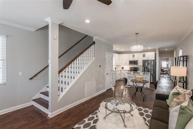 Open floorpan with tall ceilings and real hardwood