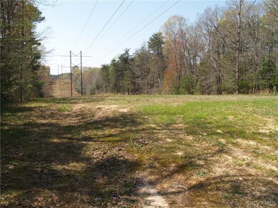 100' overhead power line crosses property.
