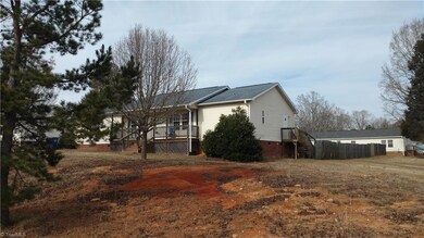 Right side view of home and Privacy Fence