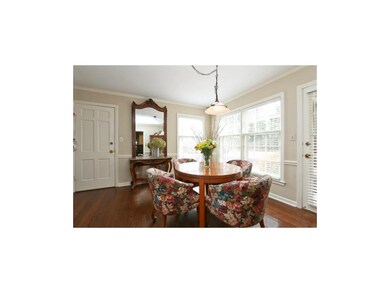 Dining room leads to screened porch.