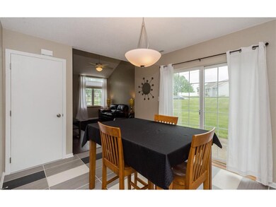 Additional view of dining area w/ sliders to patio