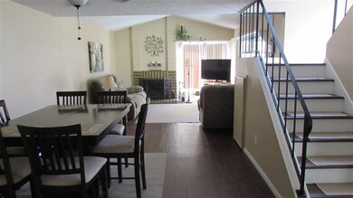 Dining area leading into living room.