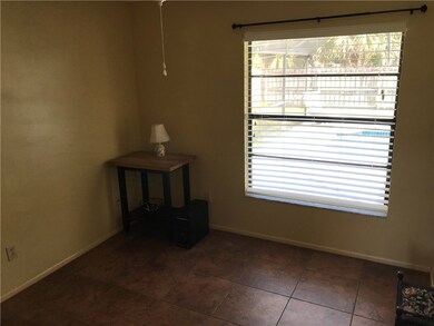 Guest bed room features picture window with view o
