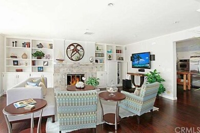 Living room includes fireplace and built-ins 