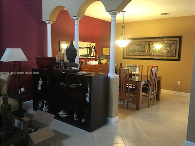 Large living room/dinning room area with high ceil