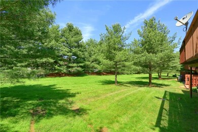 Mature tree lined back creates privacy.