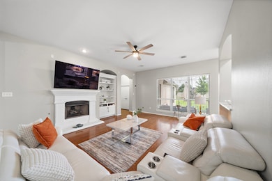 This view captures the backyard and primary suite