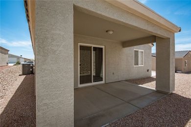 View of covered patio in the backyard
