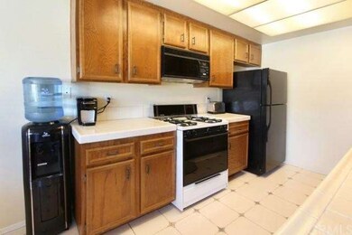 Alternate view of kitchen.