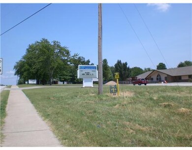 Land. next to Grace Church
