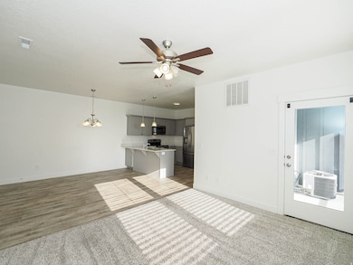 938 W Coral Charm Way unit L203, Saratoga Springs, UT 84045 - photo 6